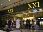 XXI